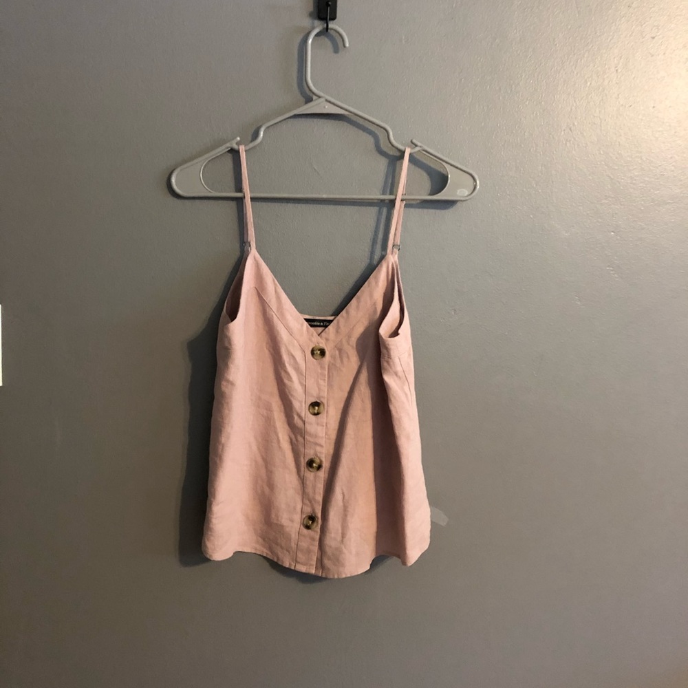 Adorable baby’s pink top